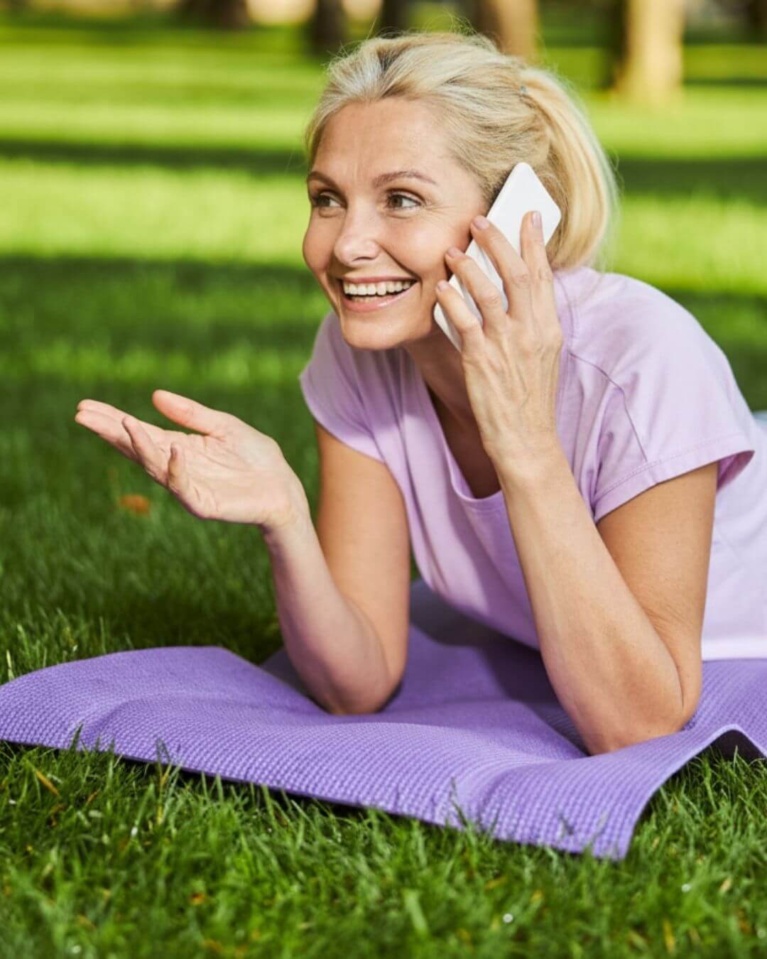 happy midlife woman smiling for the camera.