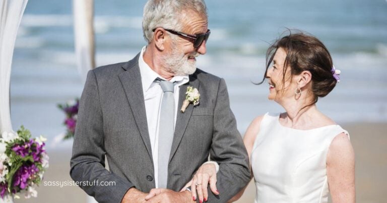 a midlife bride and groom after their second wedding on the beach.