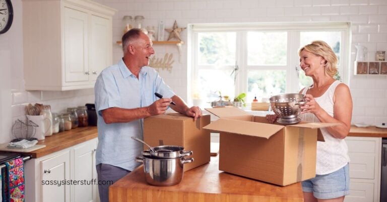 middle aged married couple work on reorganizing their kitchen together.