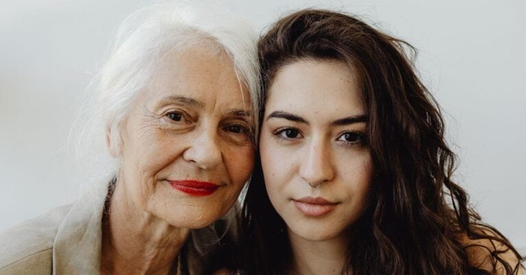 grandmother and adult granddaughter cheek-to-cheek as the elder questions what do you want your legacy to be?