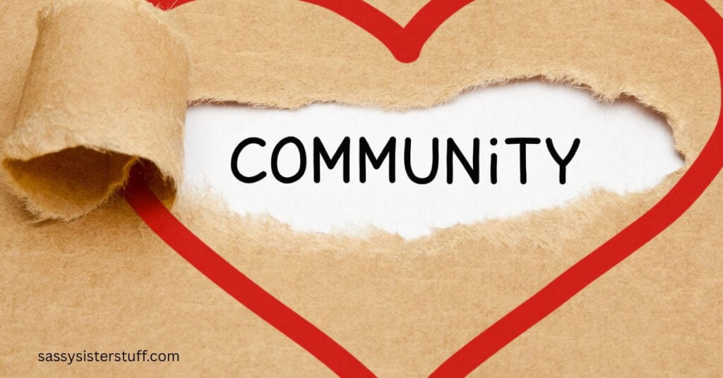 the word COMMUNITY under a piece of torn paper.
