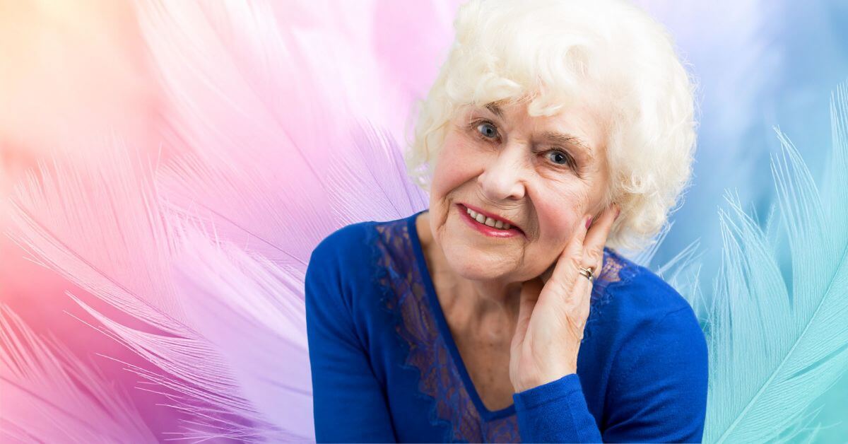 featured image for Quotes about Retirement article, close-up of happy woman who has recently retired.